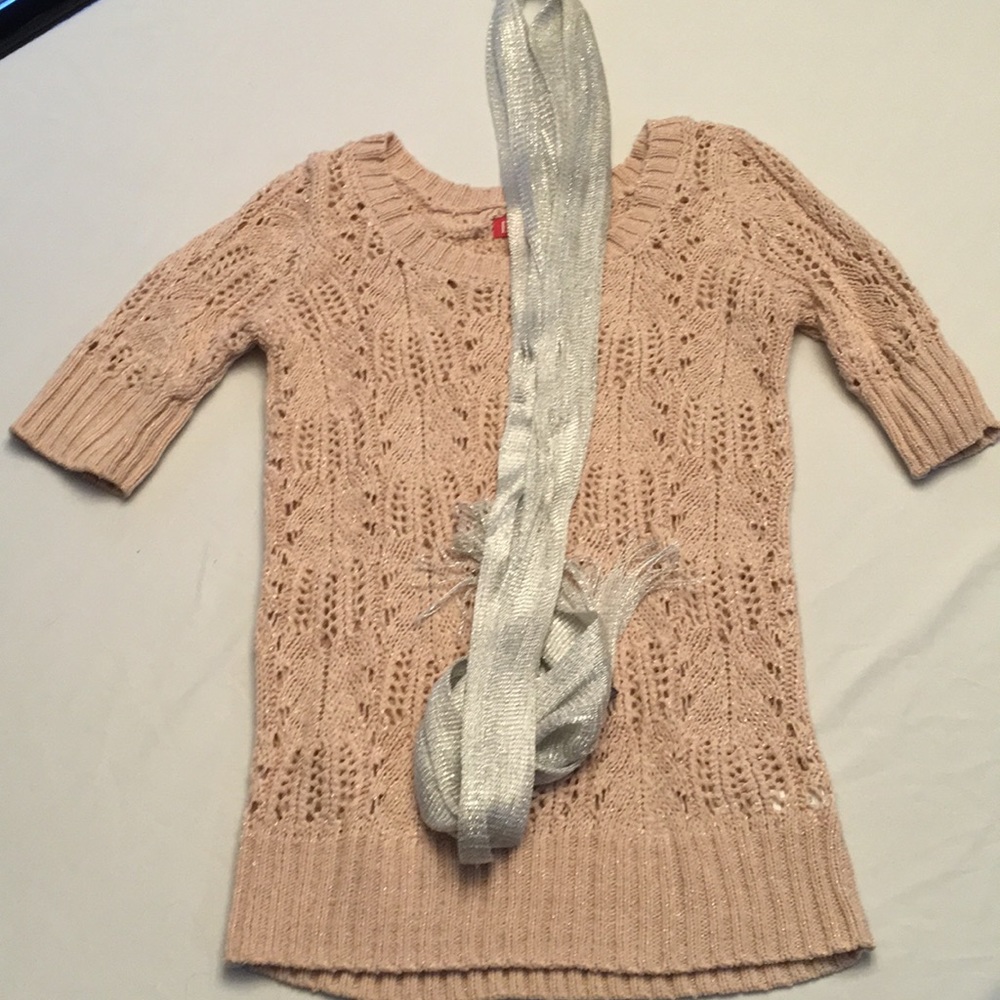 Sparkly pink sweater with narrow silver scarf